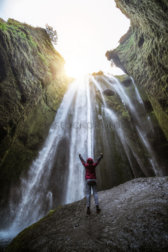 Similar – Backpacker jumping on landscape