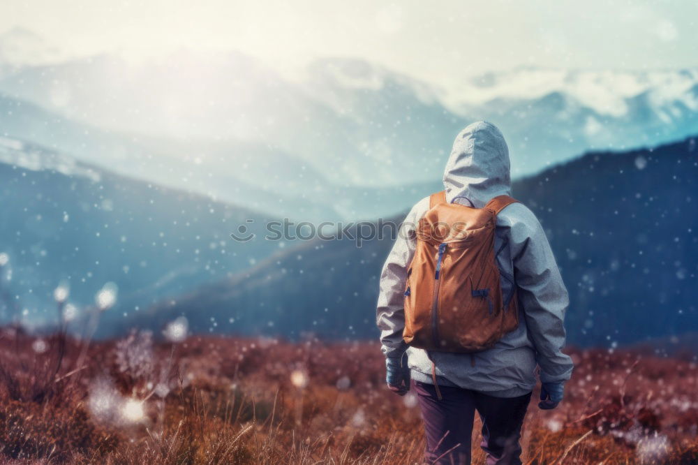 Similar – People climbing hill in snow