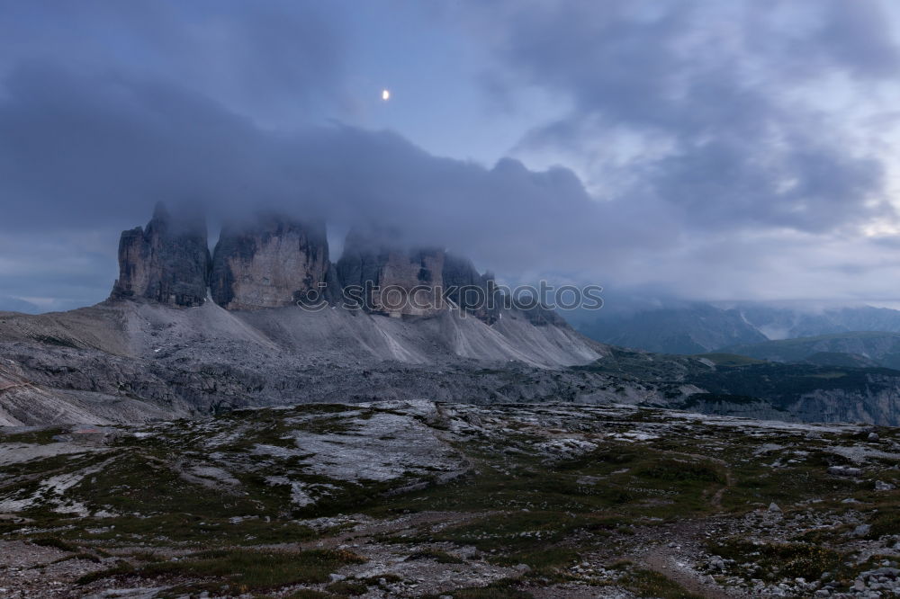 Similar – Storms in the Dolomites with rainbow