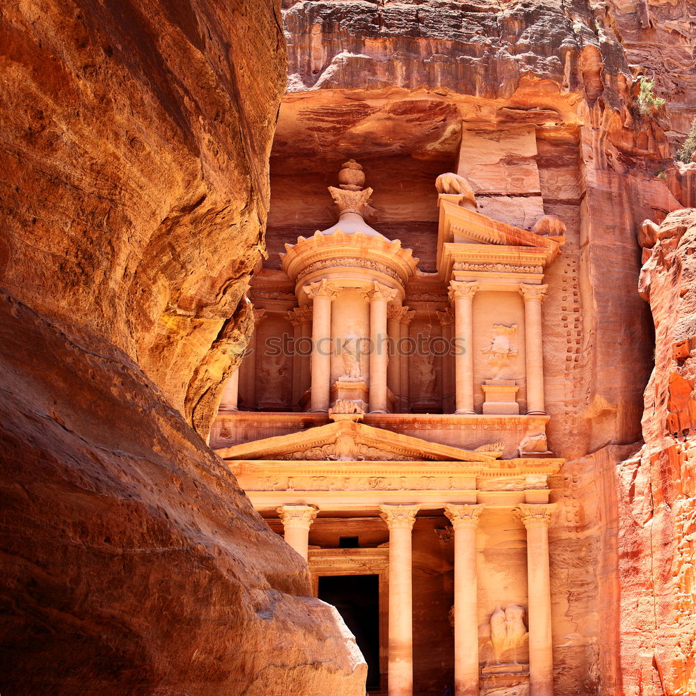 Similar – Image, Stock Photo Camels on ground against ancient temple carved in rock