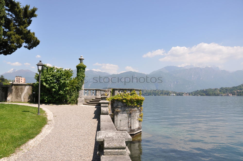 Similar – Image, Stock Photo Summer on Lake Maggiore with a man who takes pictures