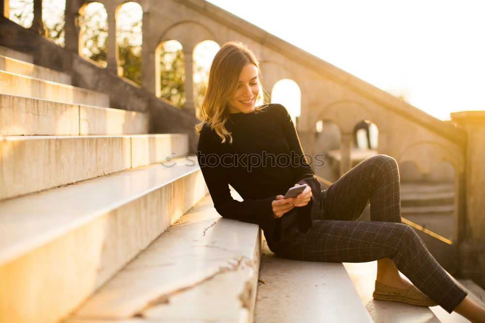 Beautiful young caucasian woman smiling in steps