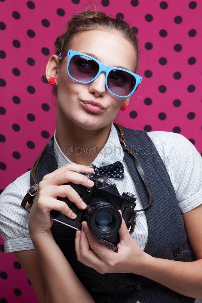 Similar – Image, Stock Photo Young woman taking pictures with an instant camera