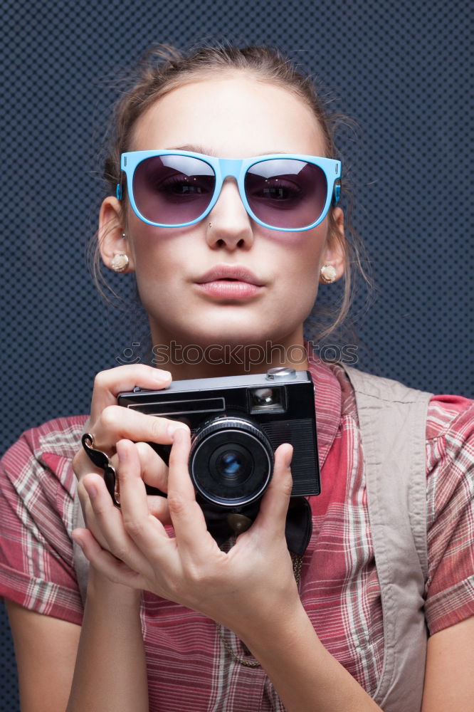 Similar – Image, Stock Photo Young woman taking pictures with an instant camera