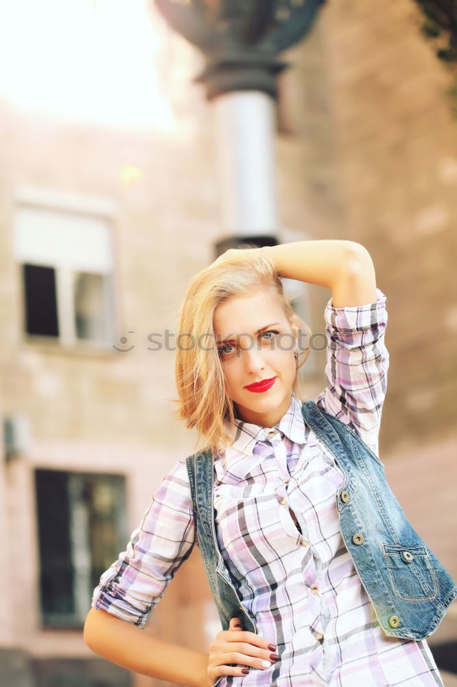 Similar – Image, Stock Photo Funny young blonde woman standing on urban background.