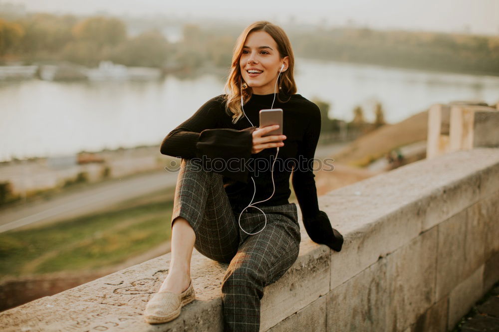 Similar – Image, Stock Photo Cheerful young woman leaning on fence