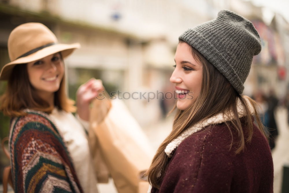 Similar – Two girls sitting on the bench and smile