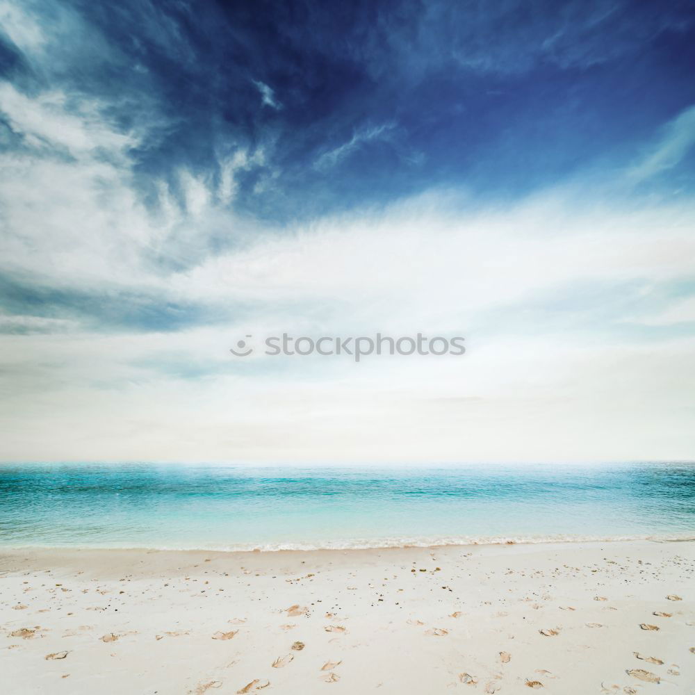 Image, Stock Photo Sand, sea and blue sky and dark clouds. At the beach of Fraser Island at the east coast of Queensland / Australia