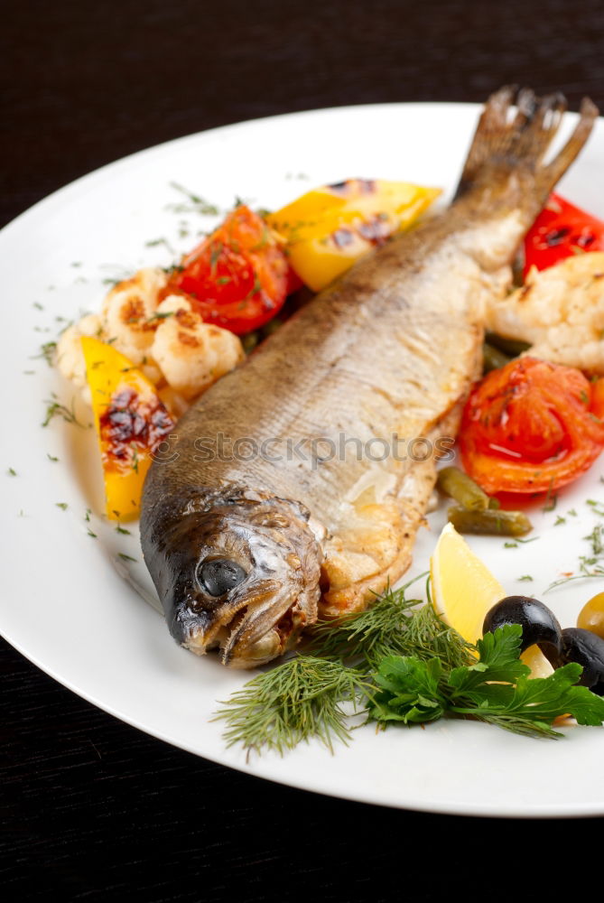 Similar – Image, Stock Photo Fried fish fillet on cast iron pan