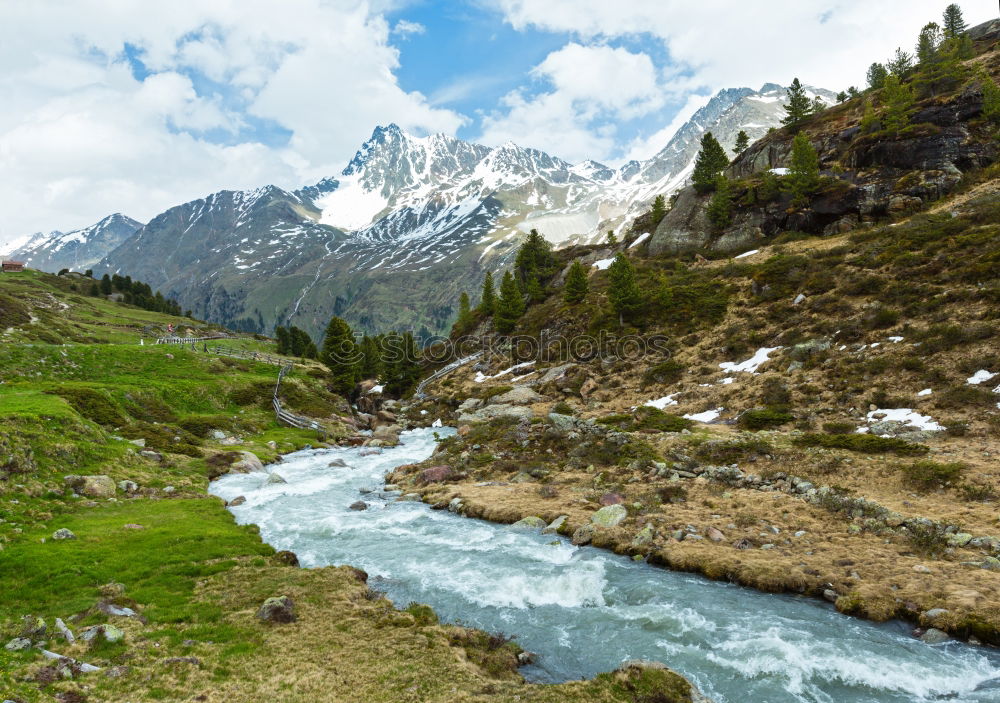 Similar – Wunderschöne Berglandschaft mit Bach bei den Alpen, Schweiz im Sommer bei blauem Himmel