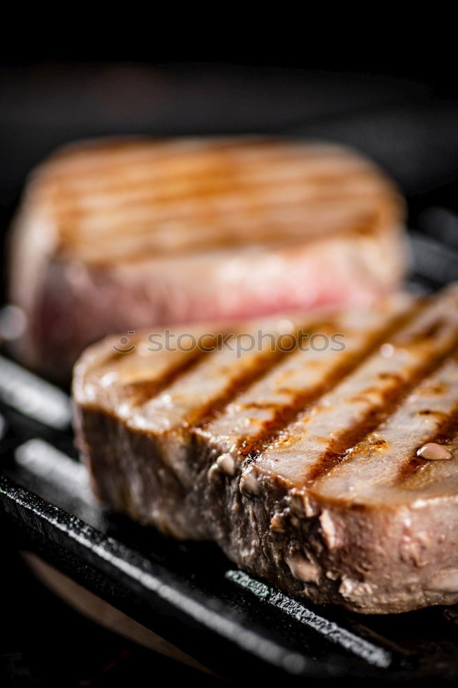 Similar – Image, Stock Photo A piece of meat fresh from the oven with a sprig of thyme