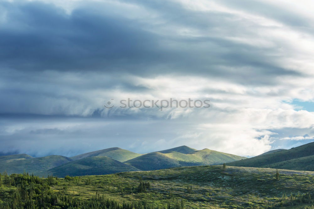 Similar – Image, Stock Photo Clouds and shadows in the Dolomites portrait