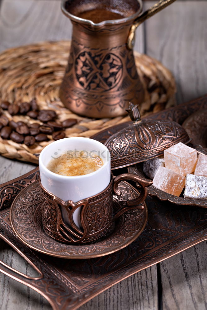 Similar – Cup of coffee on old wooden table with kitchen towel