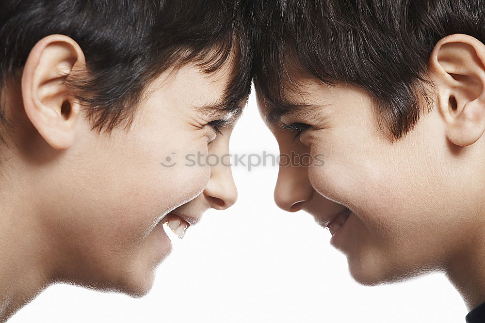 Similar – Angry children shouting over on gray background