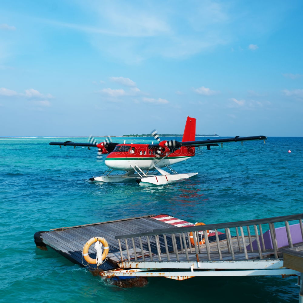 Similar – Image, Stock Photo Hydroplane parked at the pier in maldives