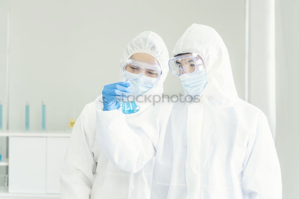 Similar – Image, Stock Photo Women standing and working in lab