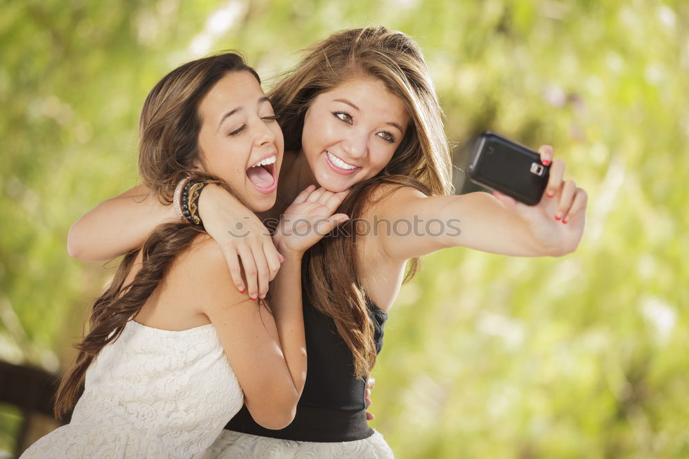 Similar – happy mother and daughter making selfie outdoor in summer