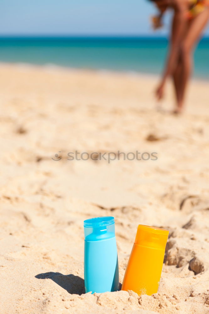 Similar – Child makes sand cake with bucket shape