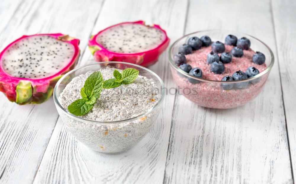 Chia yogurt with raspberries in a glass cup