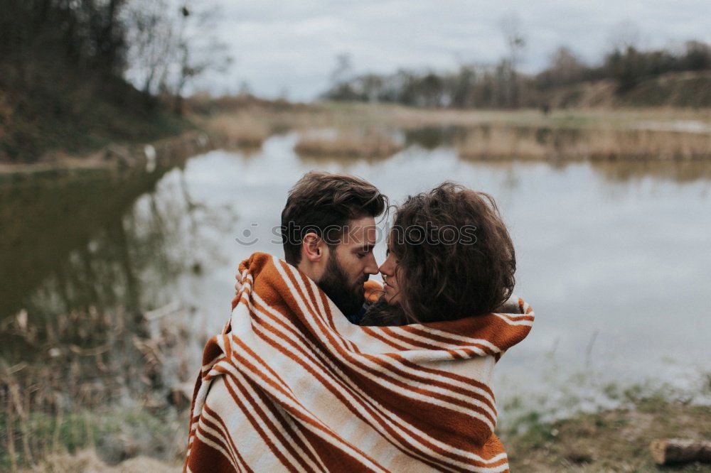 Similar – Close up of bearded man and blonde woman hugging outdoors