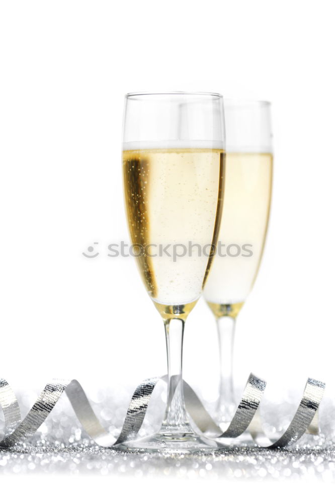 Similar – Female friends cheers clinking glasses of white wine.