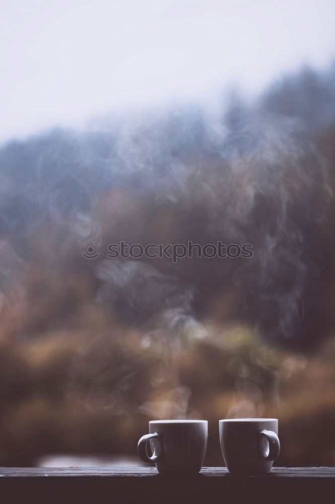 Similar – Young woman with steaming cup