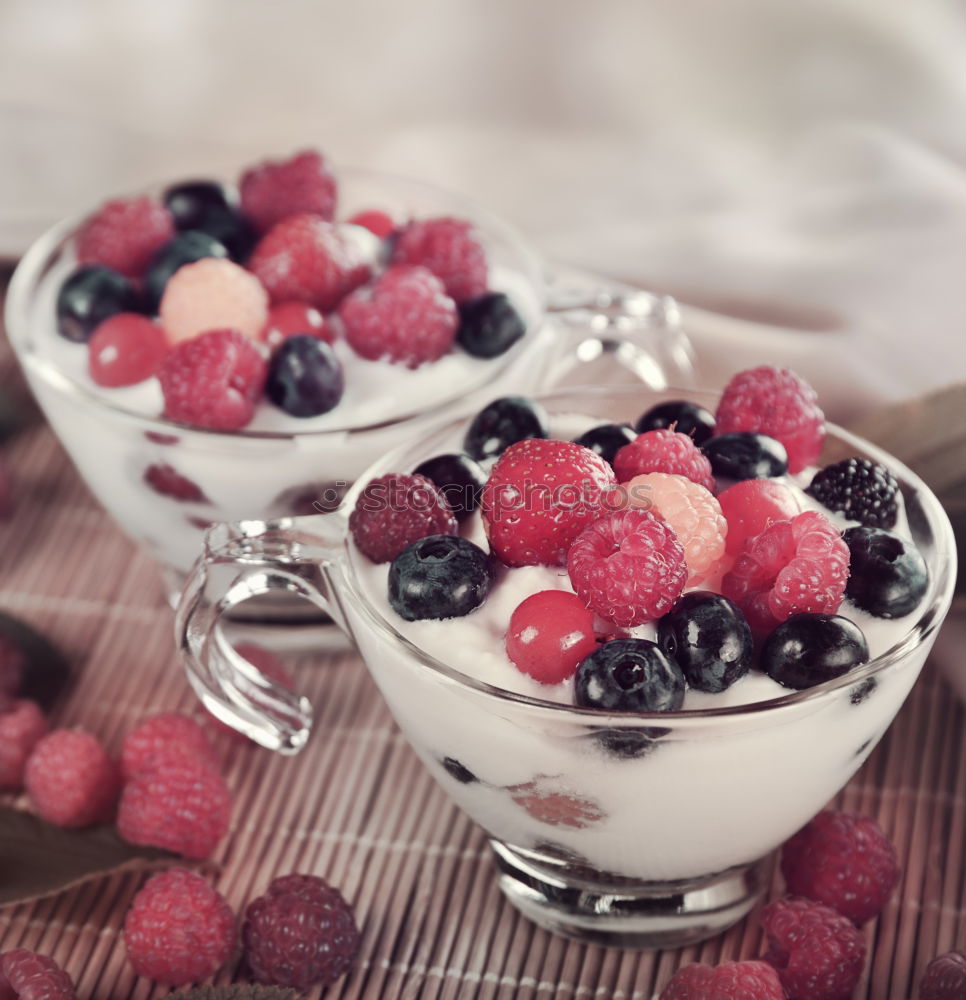 Similar – Oat flakes with milk and berries