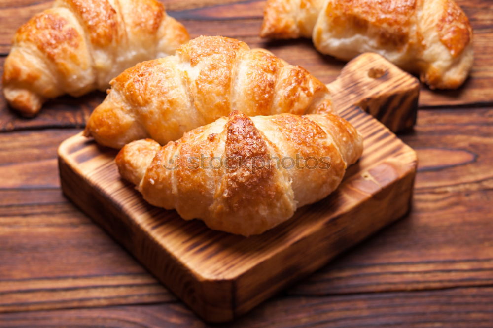 Similar – fresh bread and baked goods on wooden