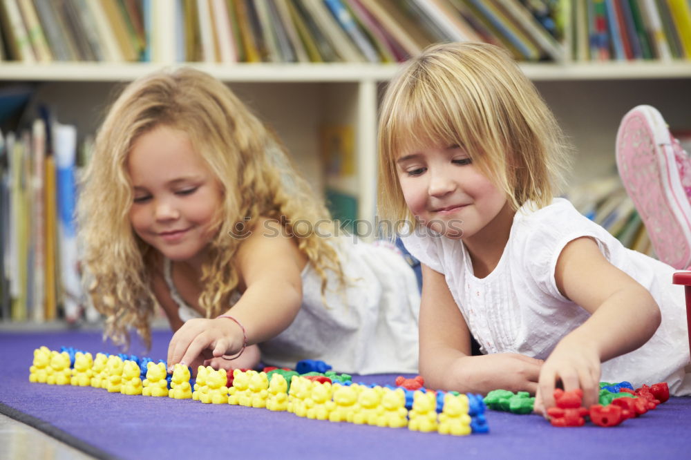 Similar – two beautiful sisters playing at home