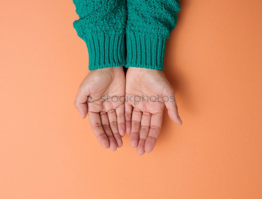 Similar – Hand embracing unrecognizable woman