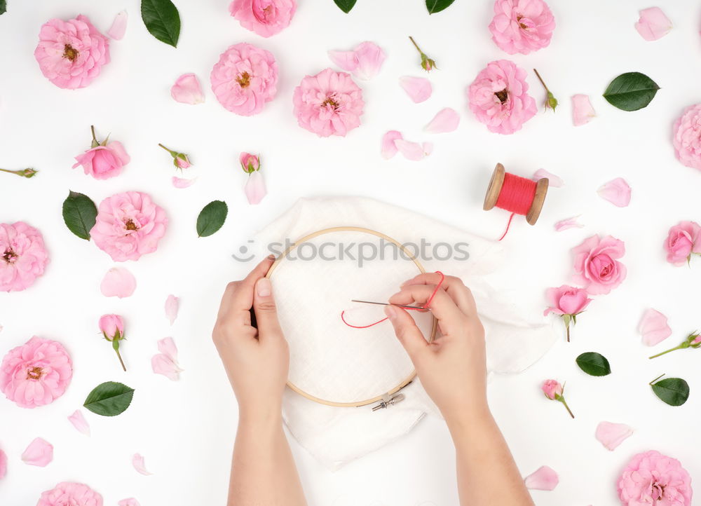 Female hands make beautiful floral decorations