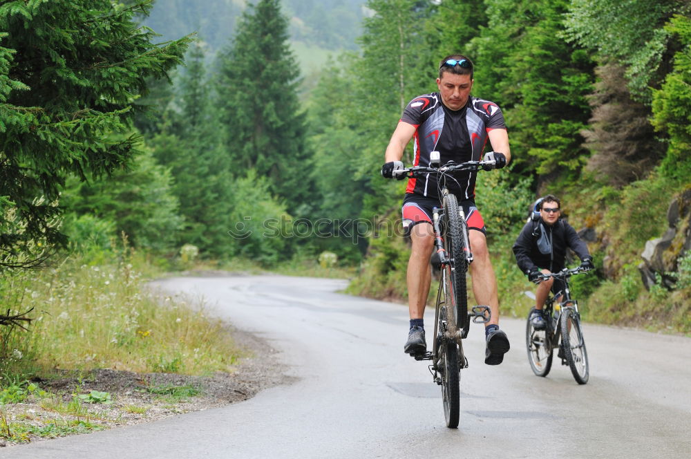 Similar – Image, Stock Photo Women riding bikes in countryside