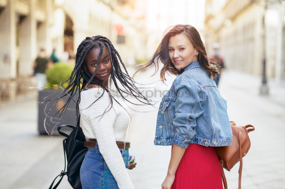 Image, Stock Photo Cheerful women posing at fence