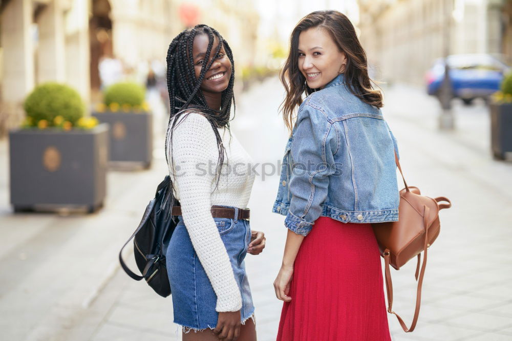 Similar – Image, Stock Photo Cheerful women posing at fence