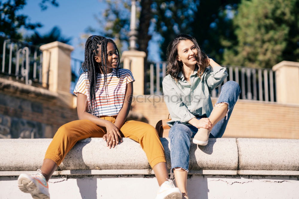 Image, Stock Photo Cheerful women posing at fence