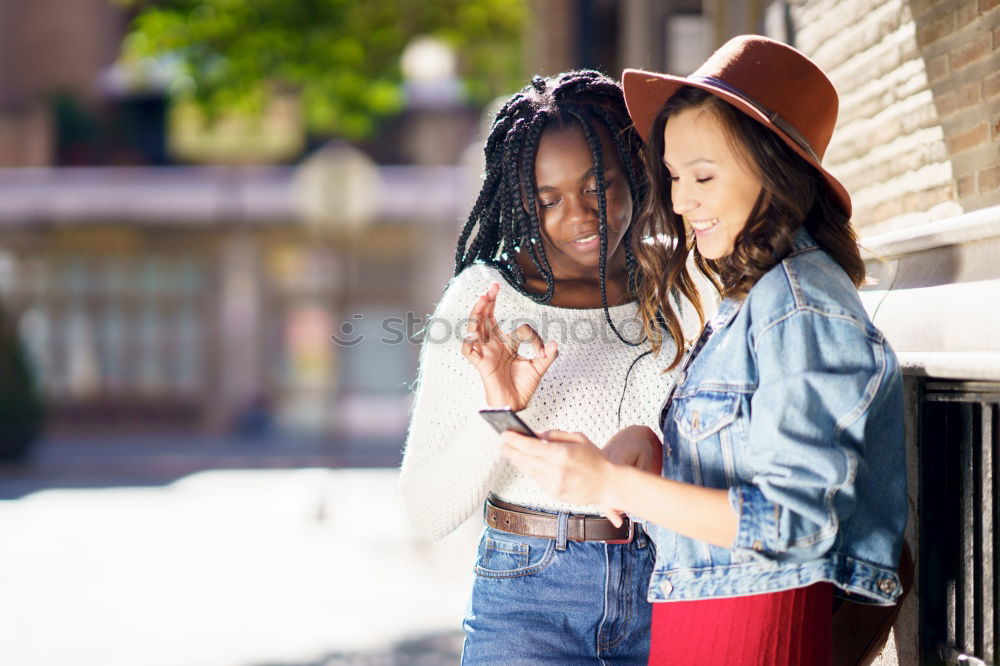 Similar – Beautiful women having fun in the street.