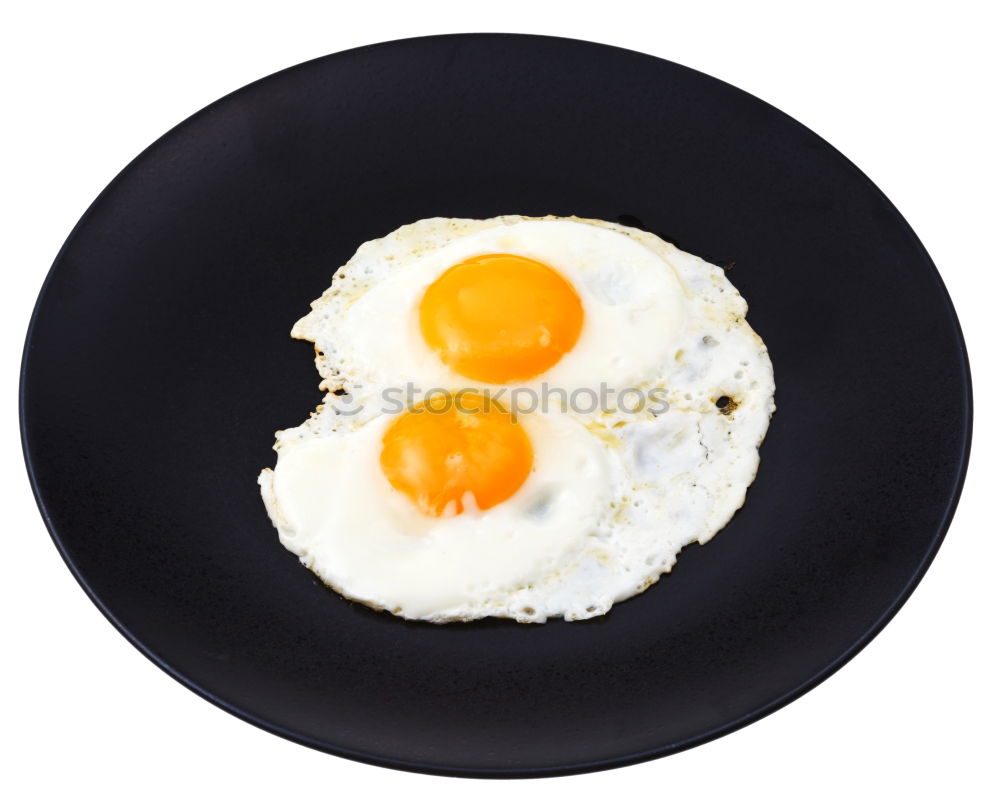 Similar – Fried egg in a old frying pan