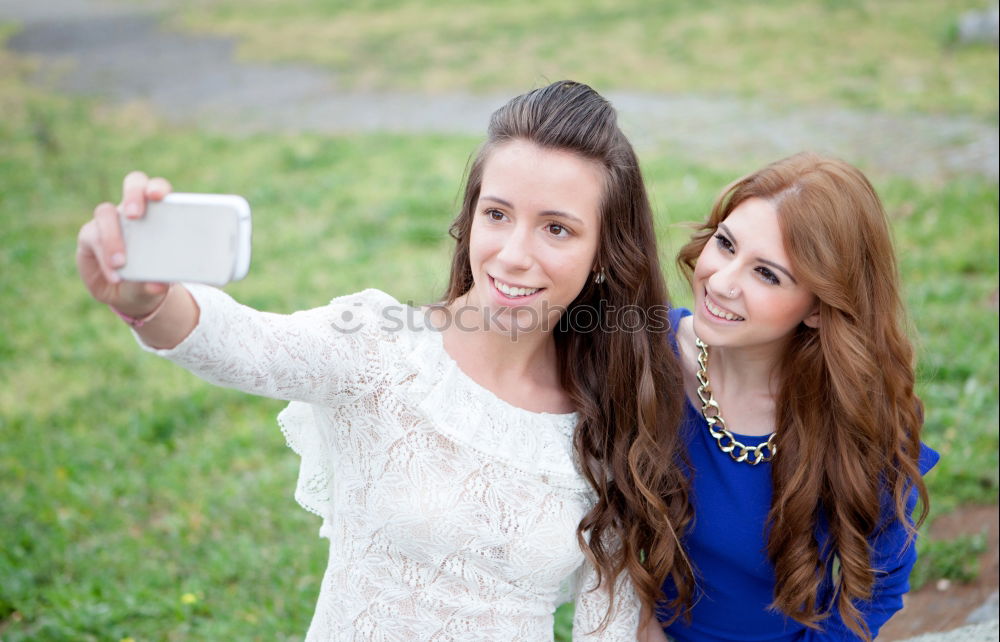 Similar – happy mother and daughter making selfie outdoor