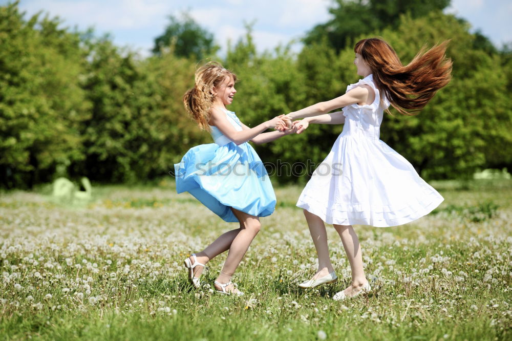 Image, Stock Photo two happy kid girlfriends playing