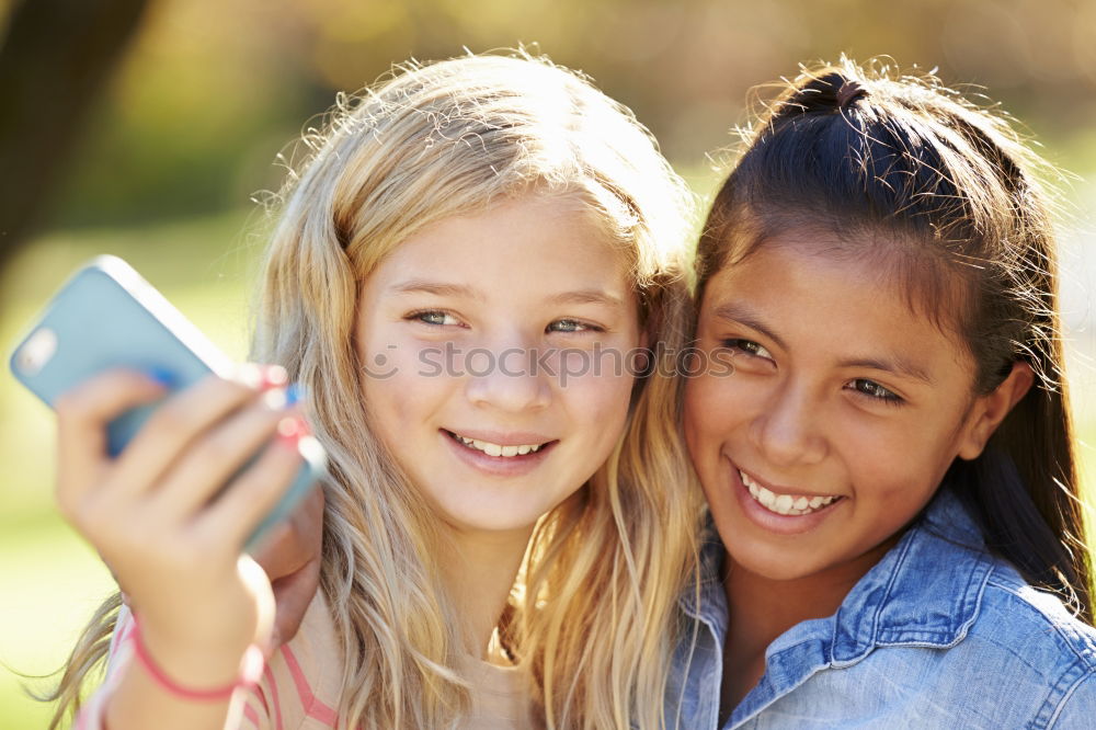 Similar – happy mother and daughter making selfie outdoor