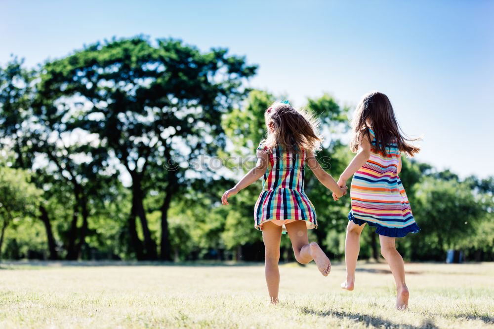 Similar – Beautiful women smiling and having fun and running.