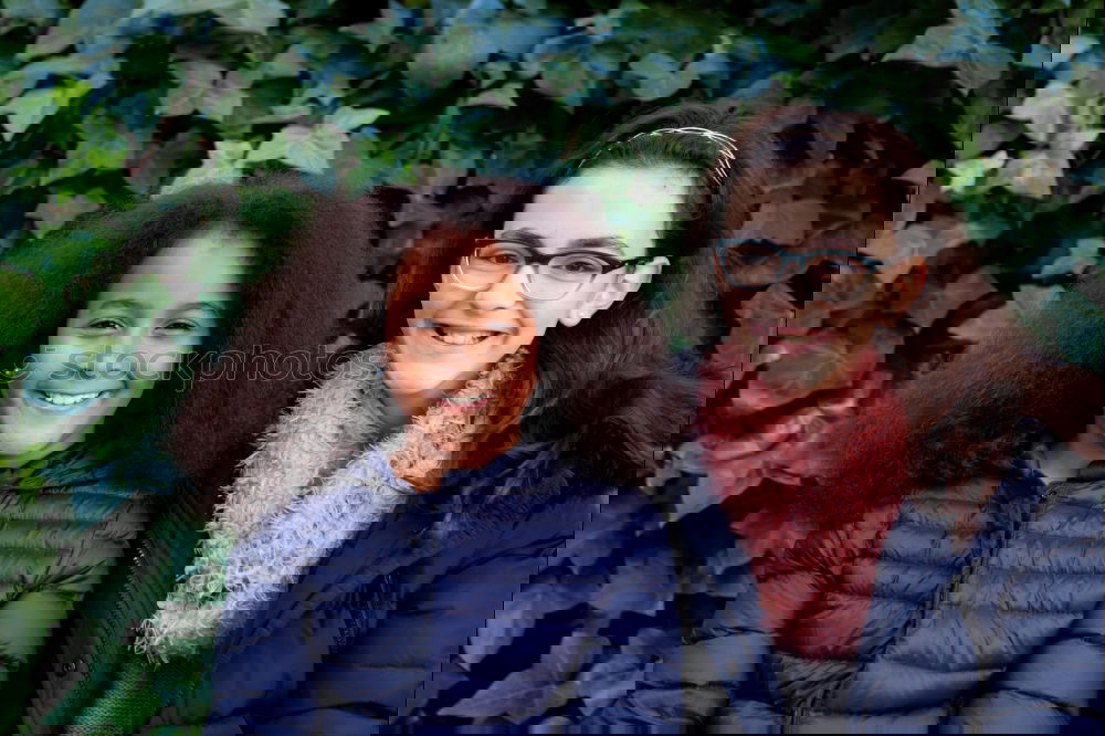 Similar – Image, Stock Photo Two happy girls in the park with coats