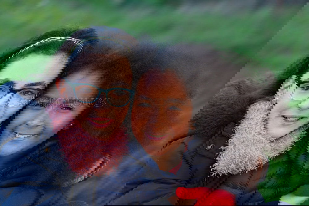 Similar – Image, Stock Photo Two happy girls in the park with coats