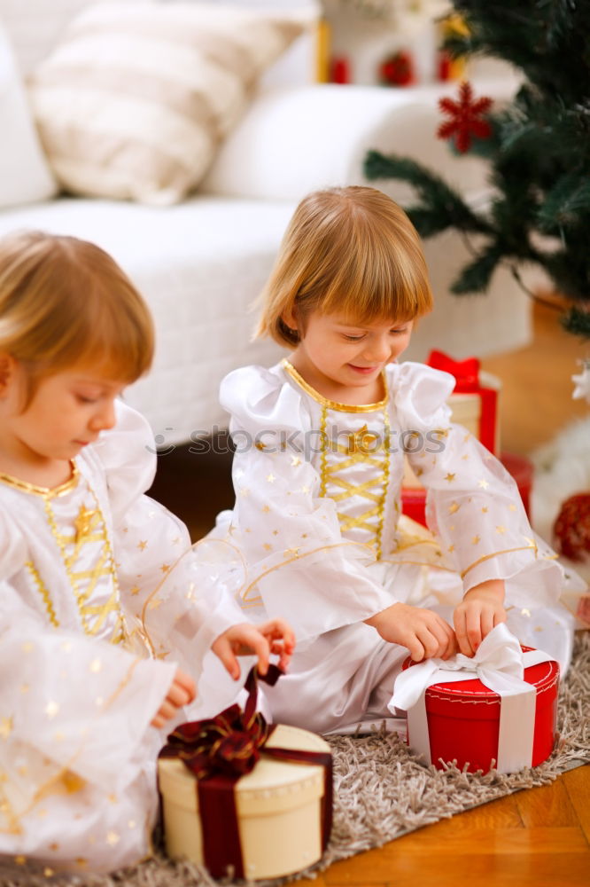 Similar – Mother and son decorating Christmas biscuits at home