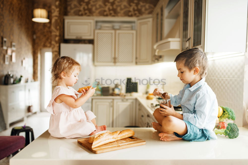 Similar – Two beautiful sister kids eating watermelon ice cream