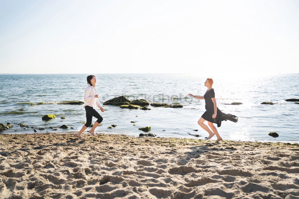 Similar – Image, Stock Photo Two sportsmen running on beach