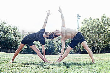 Image, Stock Photo Two young gymnast girls showing their flexibilty and stretching posing outdoor on a summer day