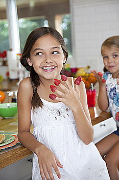 Similar – Image, Stock Photo Little sisters girl preparing baking cookies.