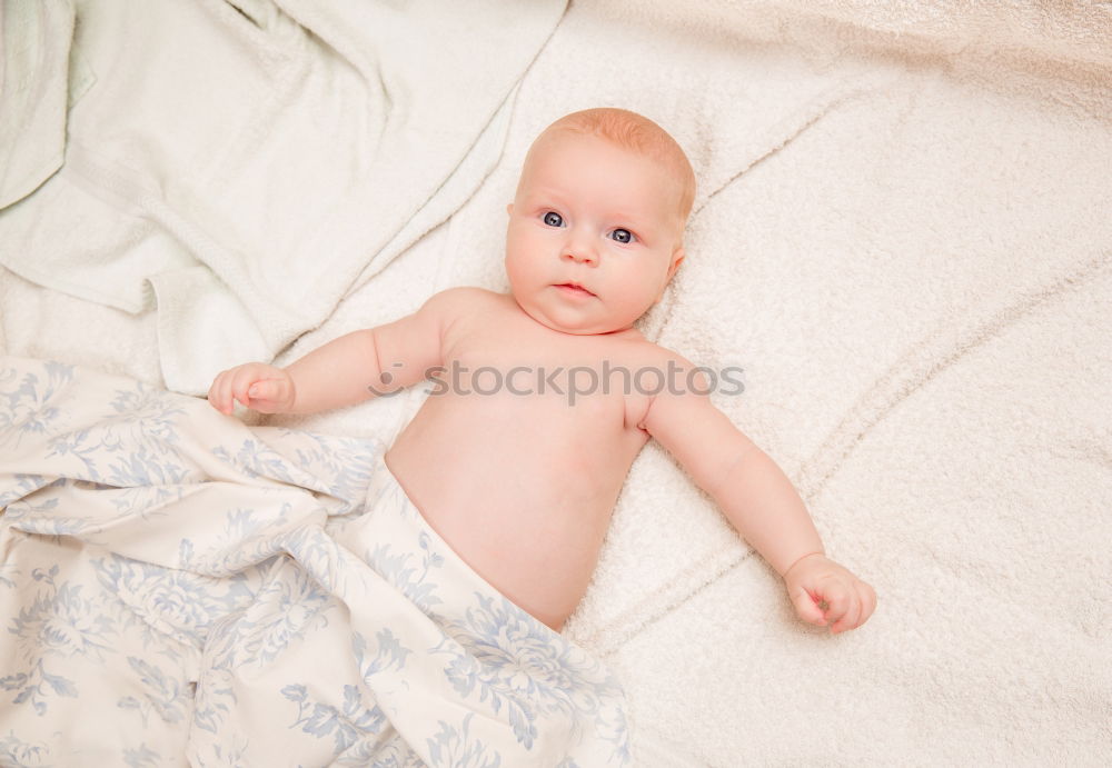 Similar – Cute Baby Girl Lying in the Crib