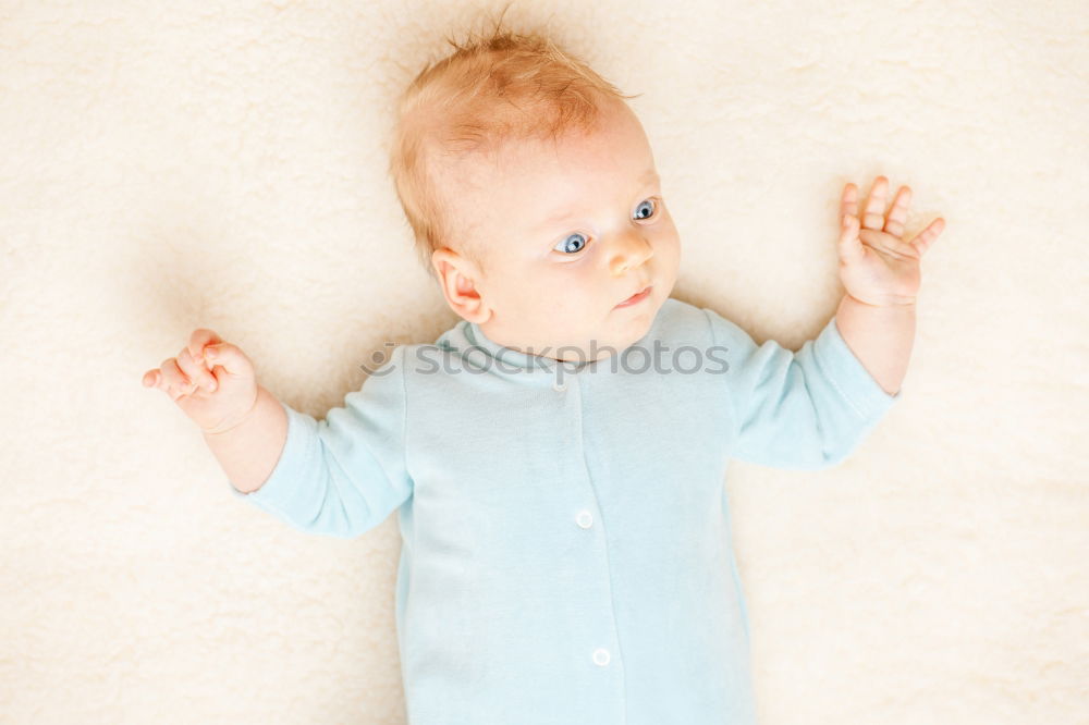 Similar – Cute Baby Girl Lying in the Crib